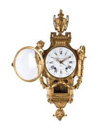 A Louis XVI Gilt Bronze Cartel Clock