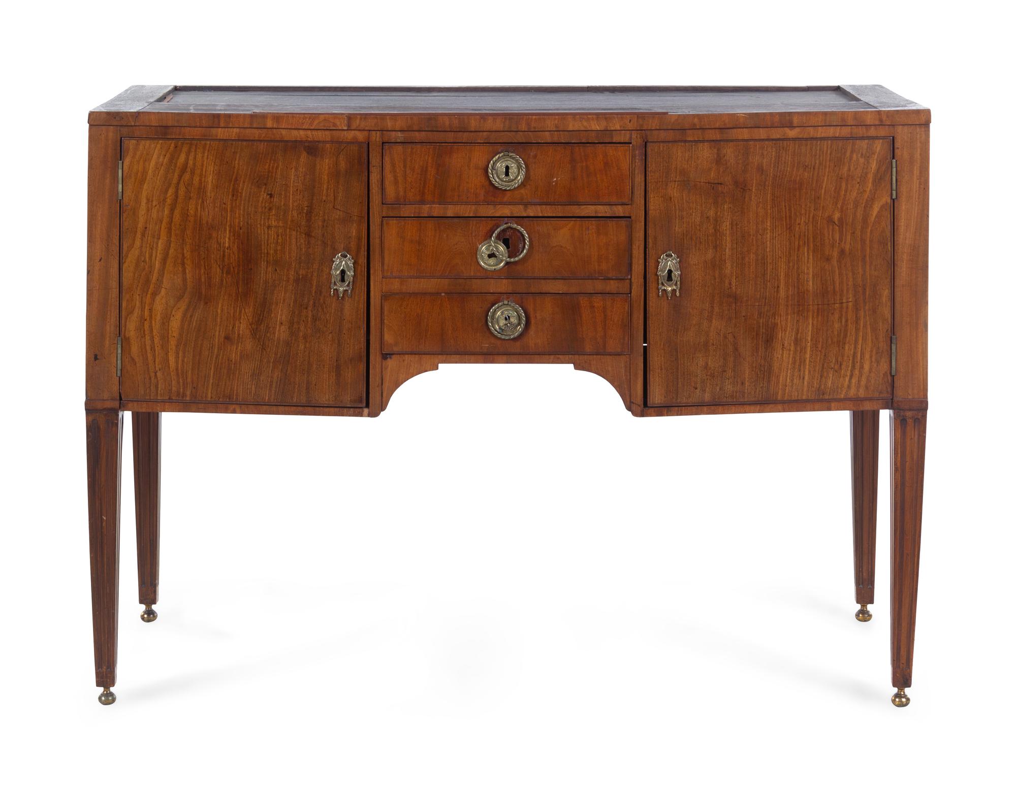 A Directoire Style Carved Mahogany Sideboard