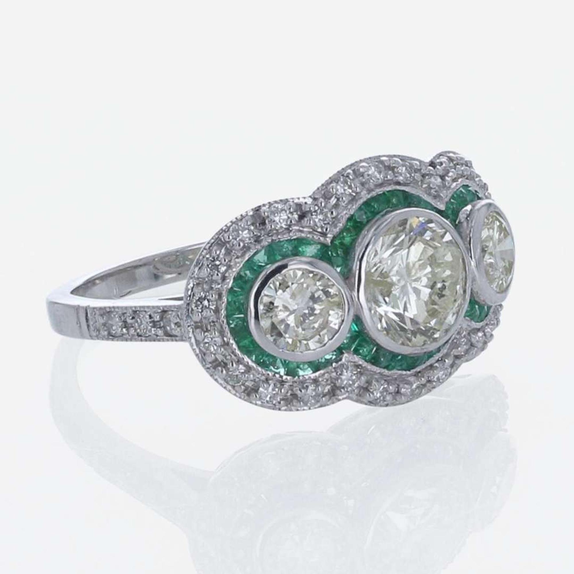 A Diamond, Emerald, and 18K White Gold Ring