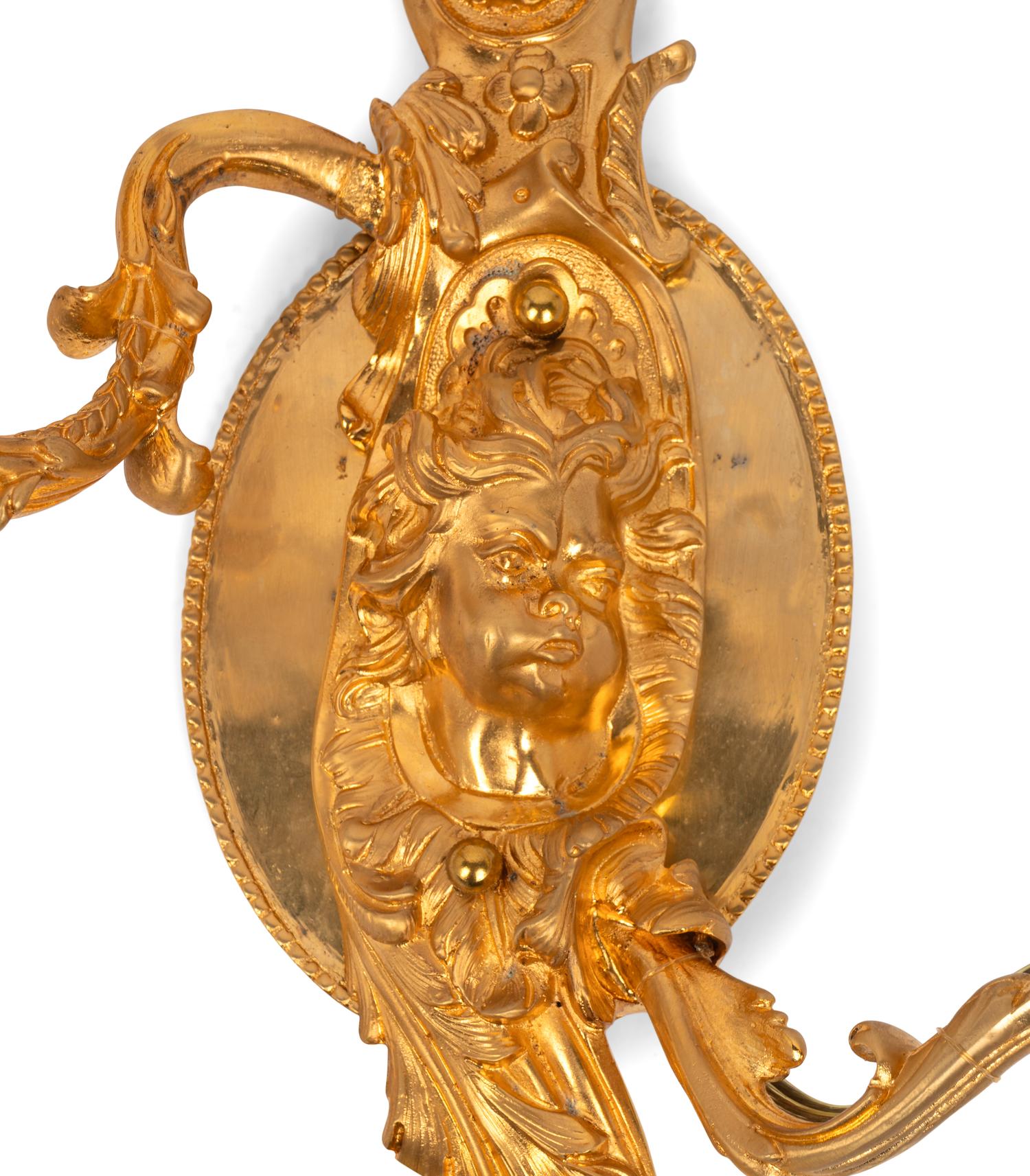 A Pair of French Gilt Metal Sconces