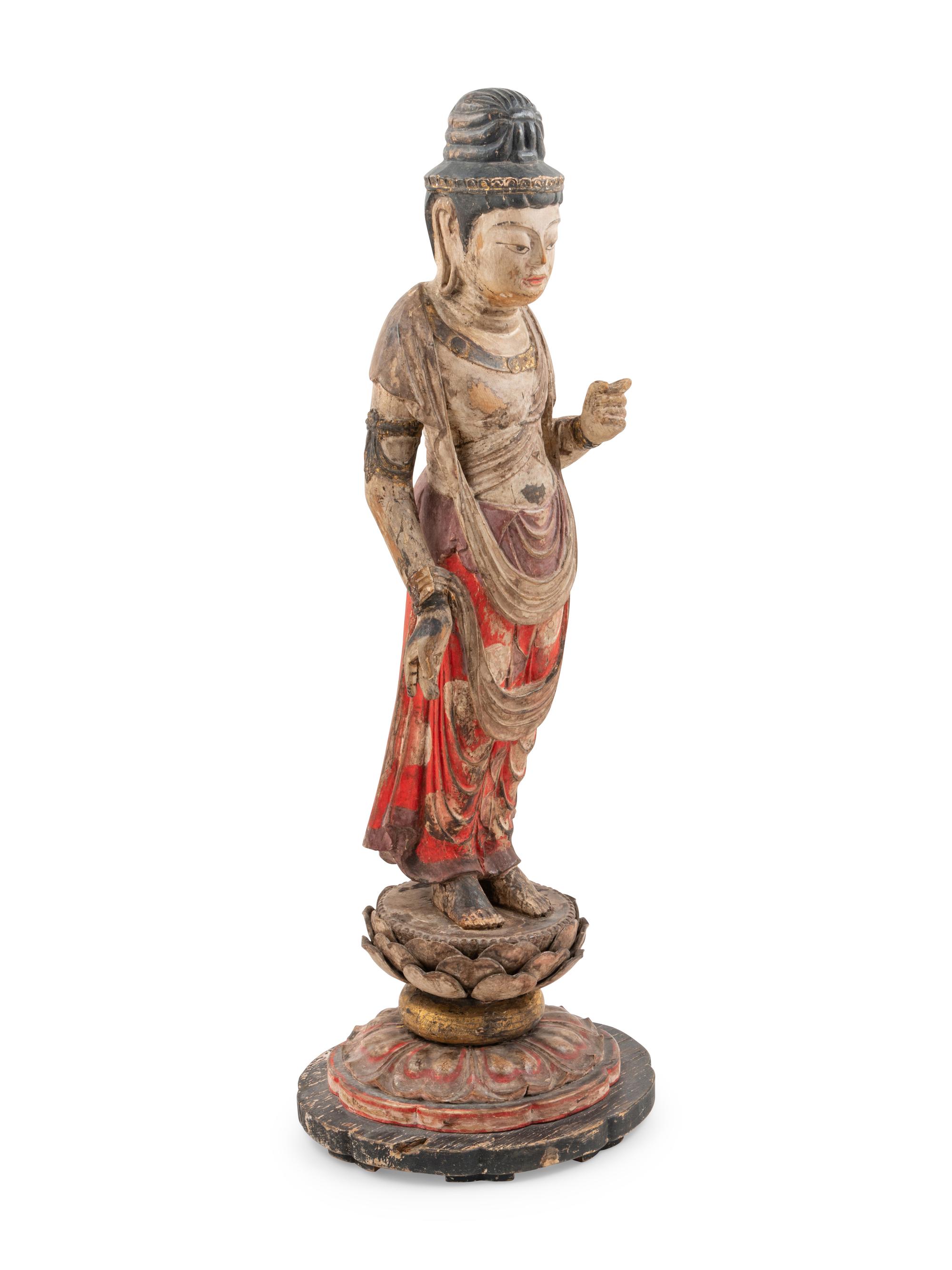 A Carved and Polychrome Lacquered Wood Standing Buddha