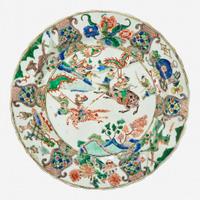 A Chinese famille verte-decorated “Mounted Warriors” charger Kangxi period