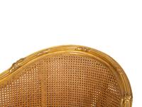A Louis XV Style Caned Giltwood Settee