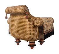 A Pair of Mackenzie Childs Whimsical Raffia and Upholstery Armchairs
