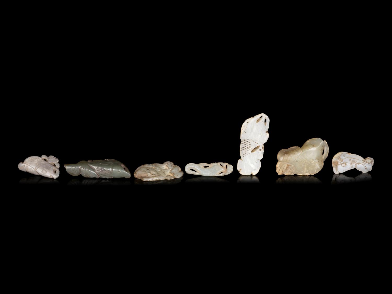 Seven Chinese Celadon Jade Carvings of Fish