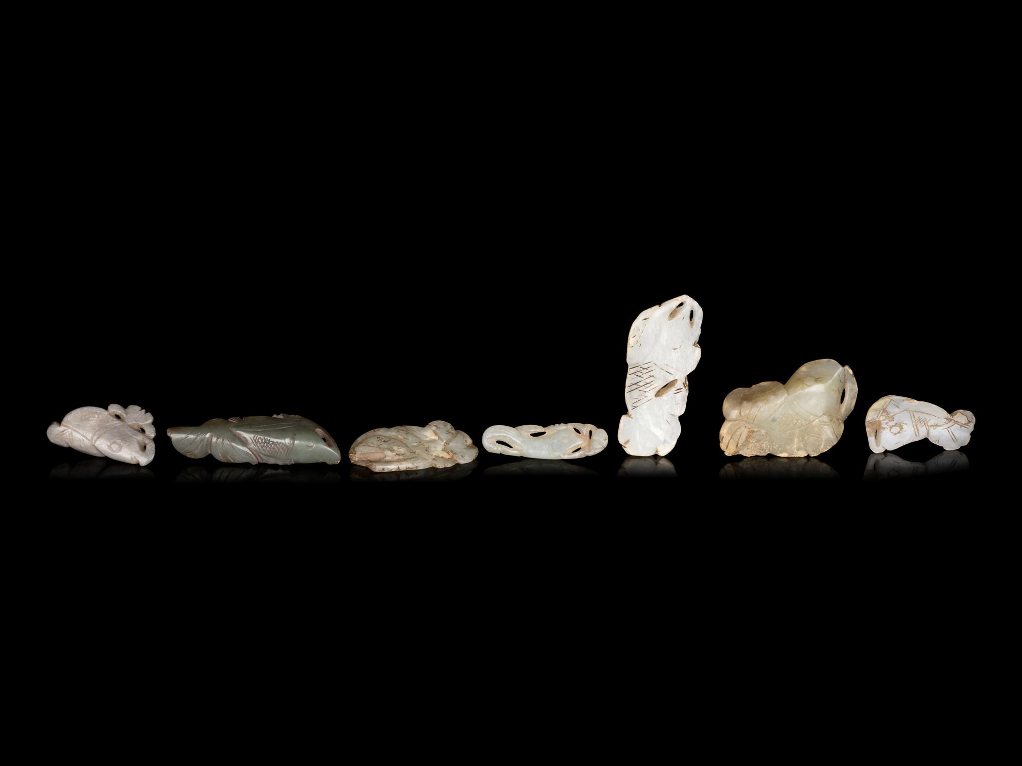 Seven Chinese Celadon Jade Carvings of Fish