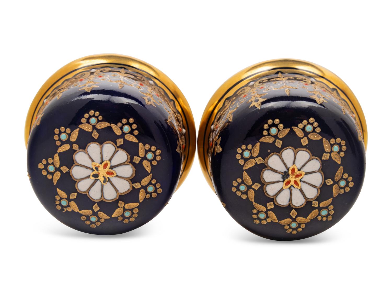 A Pair of Coalport Porcelain Covered Vases