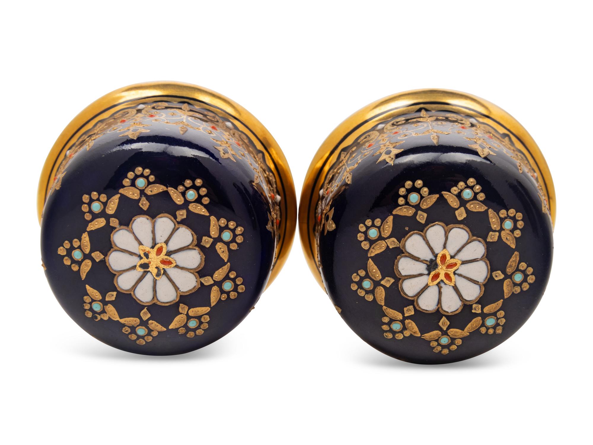 A Pair of Coalport Porcelain Covered Vases