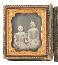 [EARLY PHOTOGRAPHY]. 16 sixth plate daguerreotype family portraits incl. parents with children.