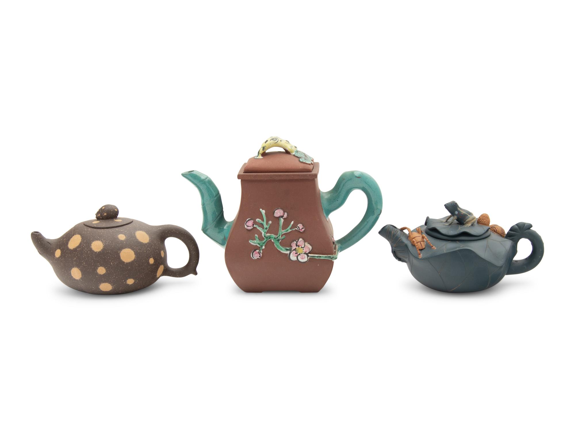 Three Chinese Yixing Pottery Teapots