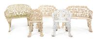 A Suite of Victorian Cast Iron Garden Furniture, Width of first 32 inches.