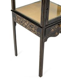 A Pair of Stenciled Black Painted Vitrine Cabinets