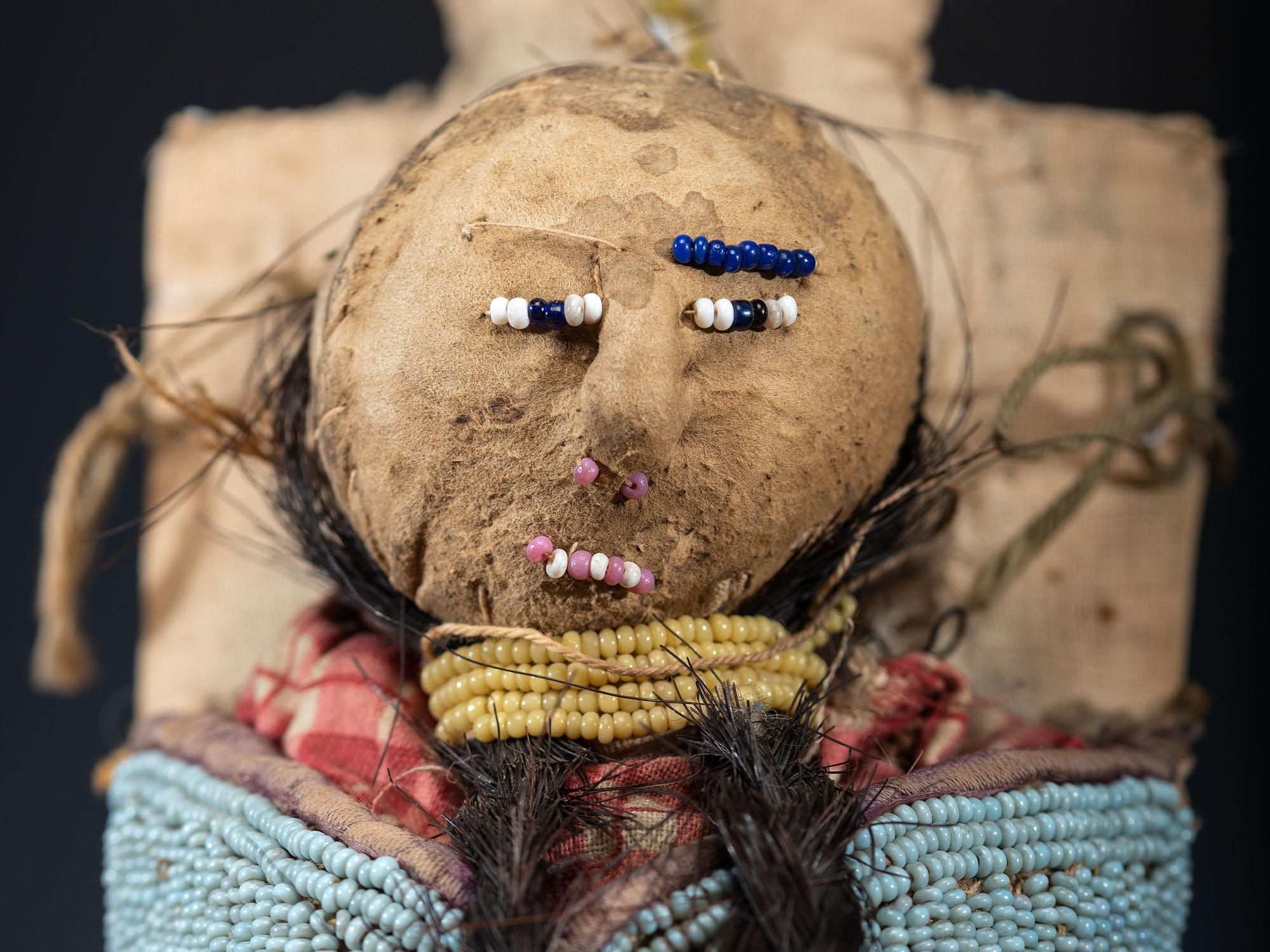 Nez Perce Beaded Pictorial Toy Cradle, with Doll