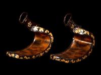 A Pair of Japanese Gold and Black Lacquered Stirrups