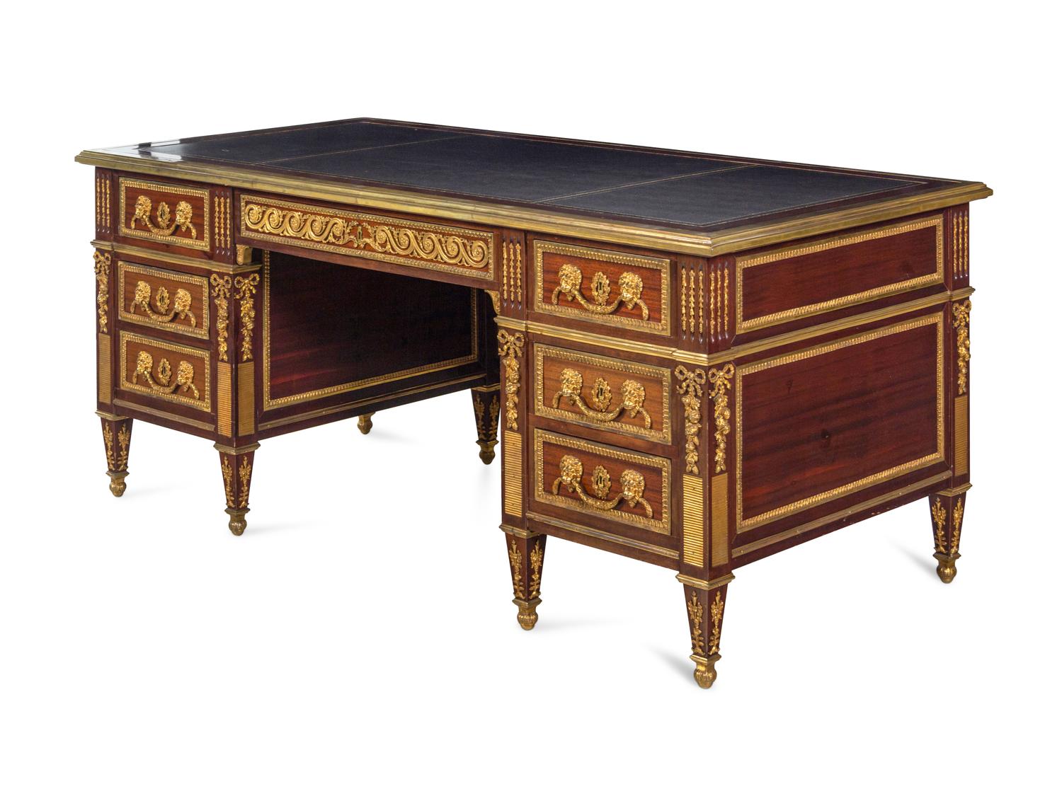 A Louis XV Style Gilt Bronze Mounted Mahogany Desk
