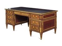 A Louis XV Style Gilt Bronze Mounted Mahogany Desk