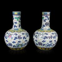 A Pair of Large Chinese Famille Rose Porcelain 'Bajixiang' Vases, Tianqiuping , Late 19th-Early 20th Century 清晚期 粉彩八吉祥大天球瓶一對