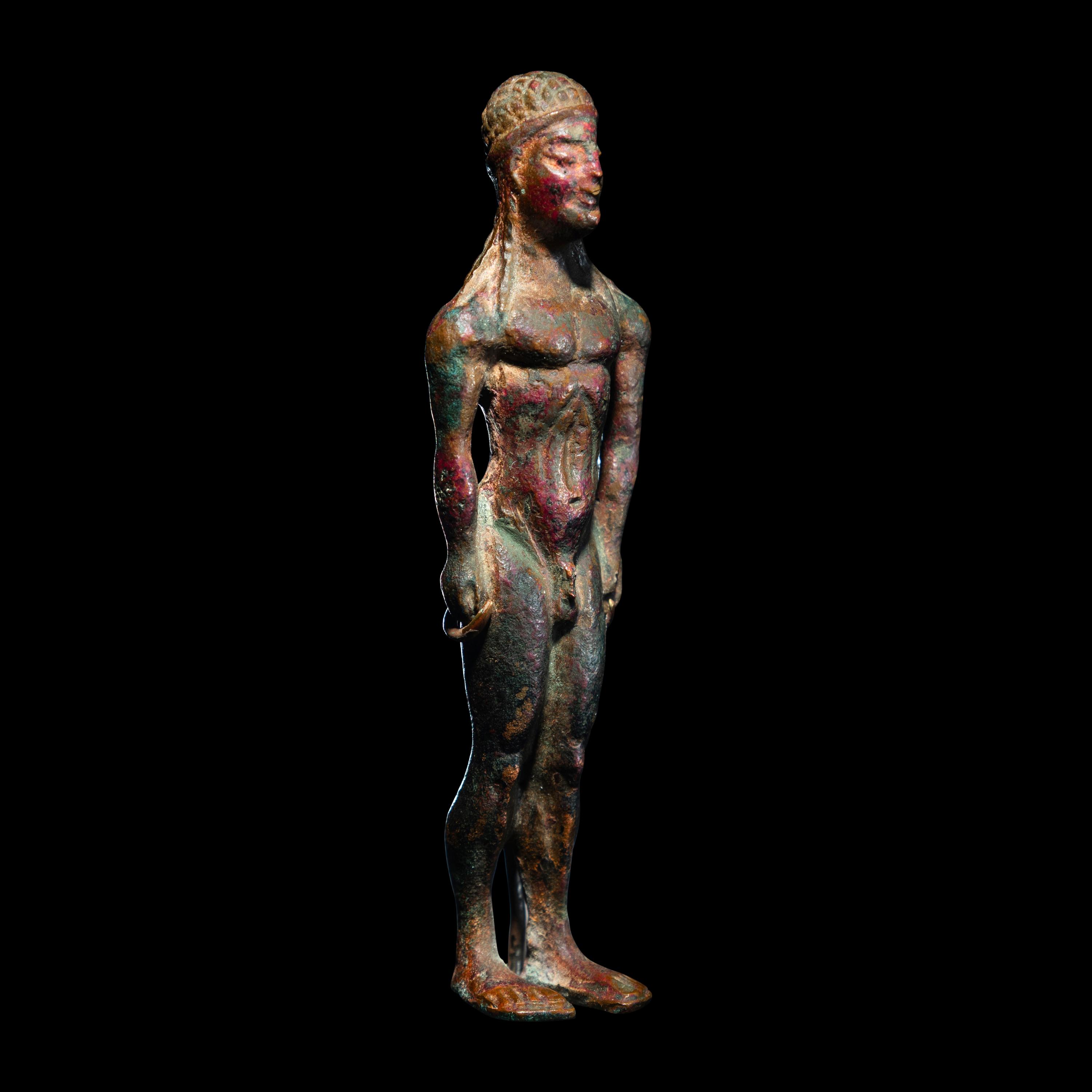 A Greek Bronze Kouros