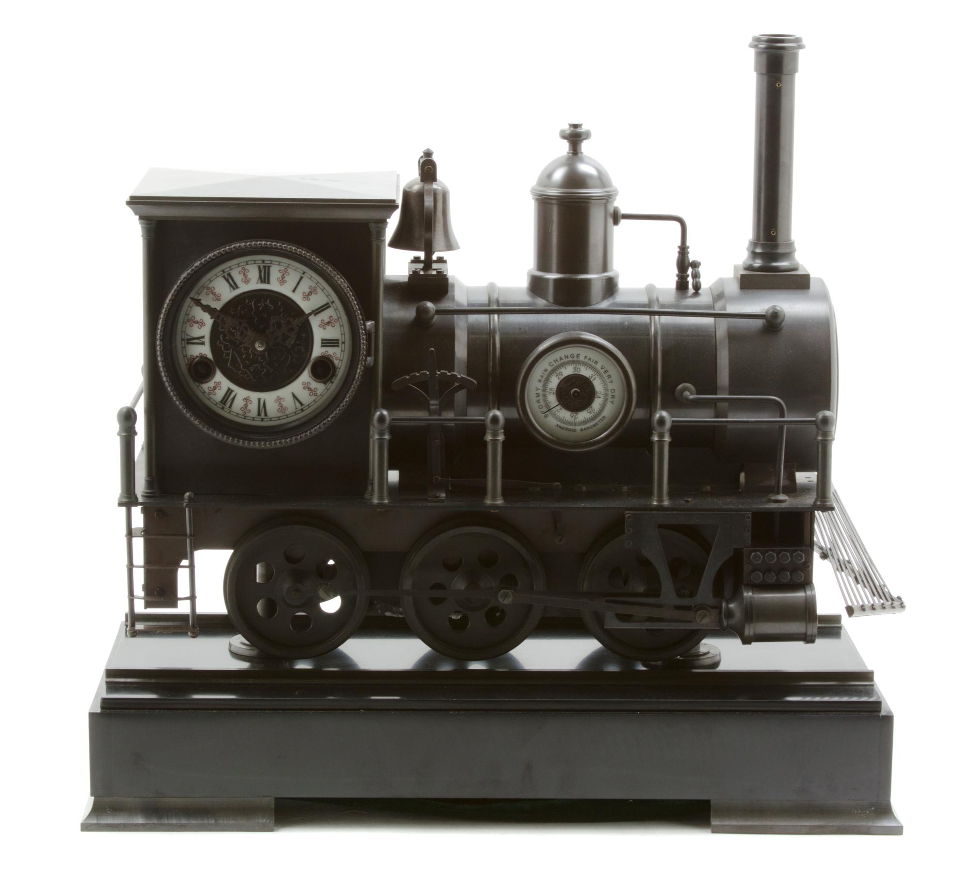 A French Bronze Industrial Style Steam Locomotive Mantel Clock, Width overall 18 3/8 inches.