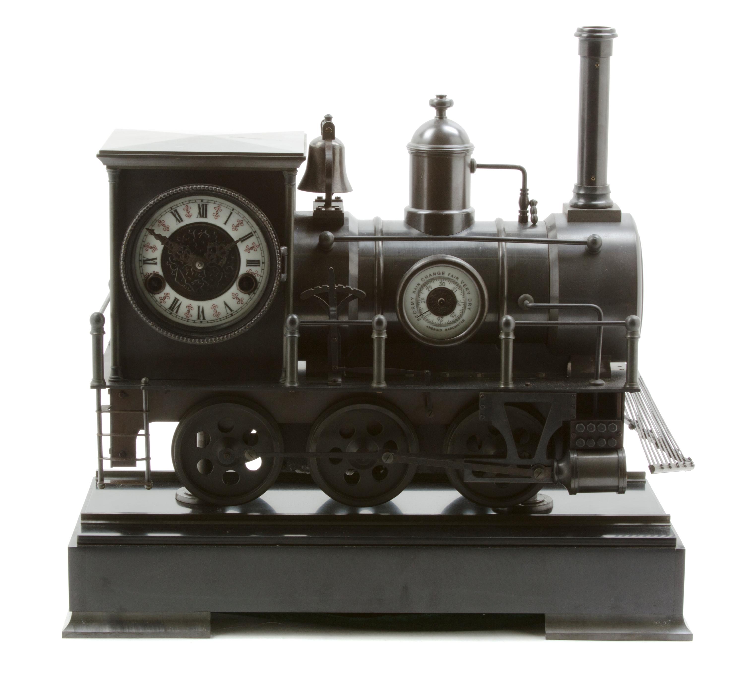 A French Bronze Industrial Style Steam Locomotive Mantel Clock, Width overall 18 3/8 inches.