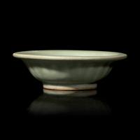 A Chinese Longquan Celadon Glazed 'Double Fish' Dish, Song-Yuan Dynasty 宋-元 龍泉窯雙魚碟