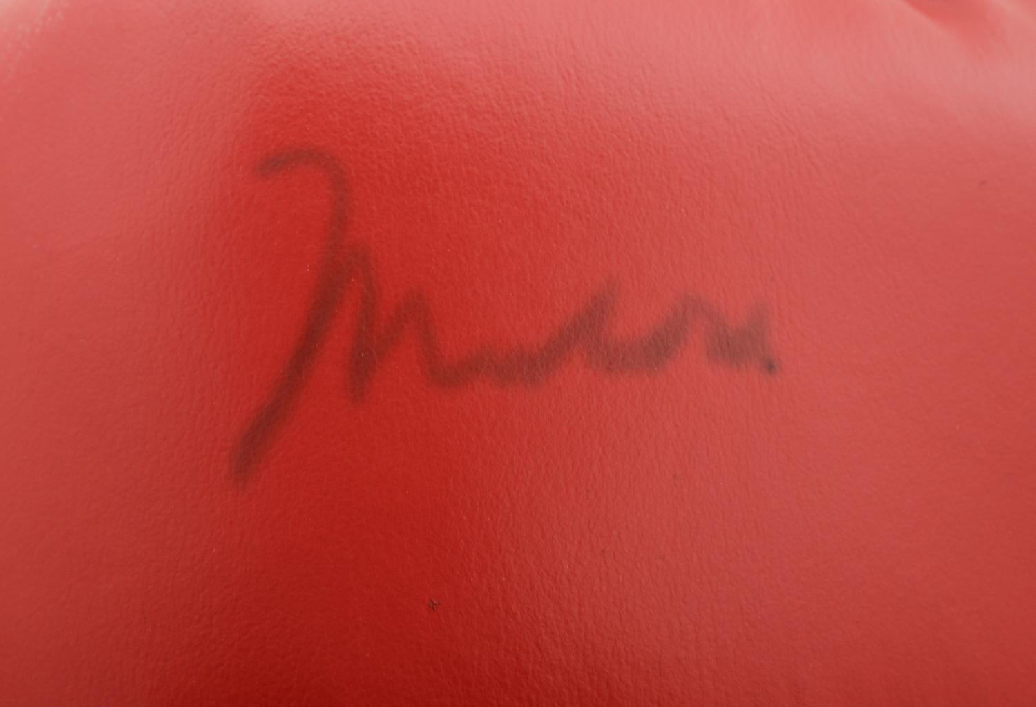A Pair of Muhammad Ali Boxing Gloves (One Signed),