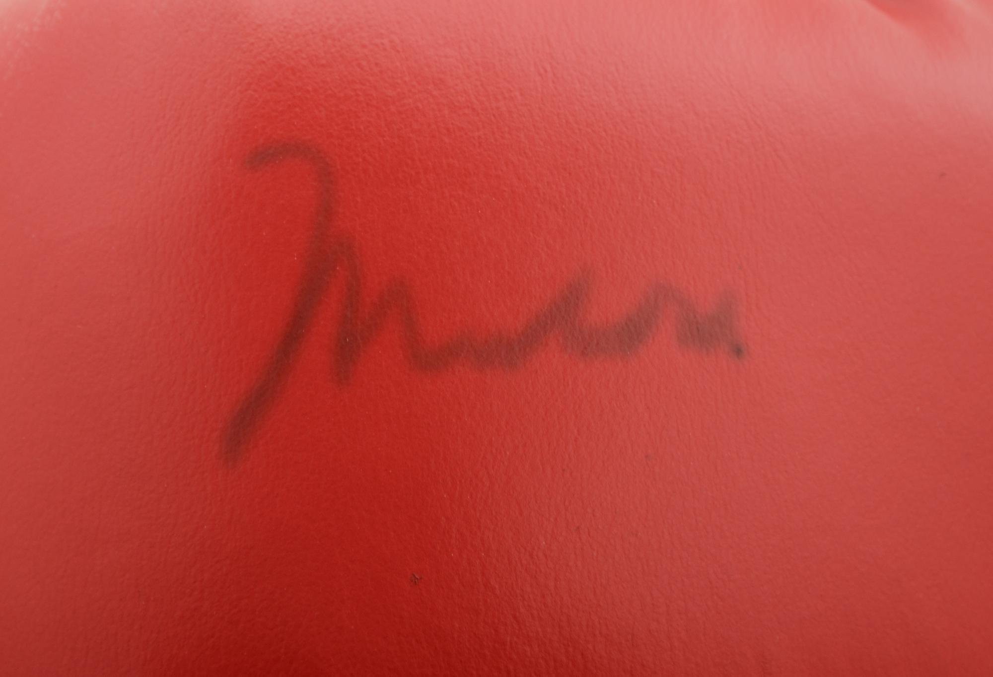 A Pair of Muhammad Ali Boxing Gloves (One Signed),