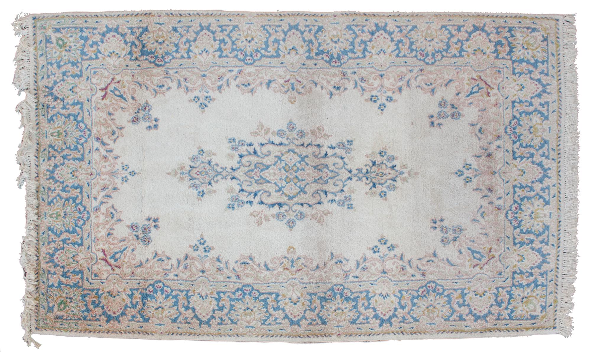 A Kerman Wool Rug 8 feet 4 inches x 5 feet. — 20TH CENTURY