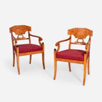 A Pair of Swedish Neoclassical Birchwood Ebonized and Parcel Gilt Armchairs circa 1820