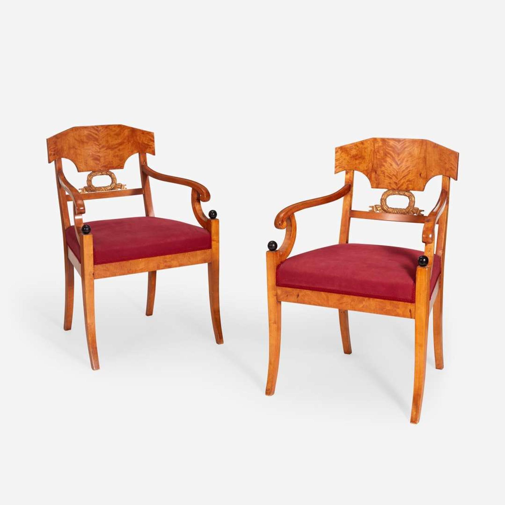 A Pair of Swedish Neoclassical Birchwood Ebonized and Parcel Gilt Armchairs circa 1820