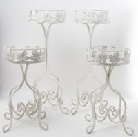 A Group of Four Painted Plant Stands Height of tallest 26 inches.