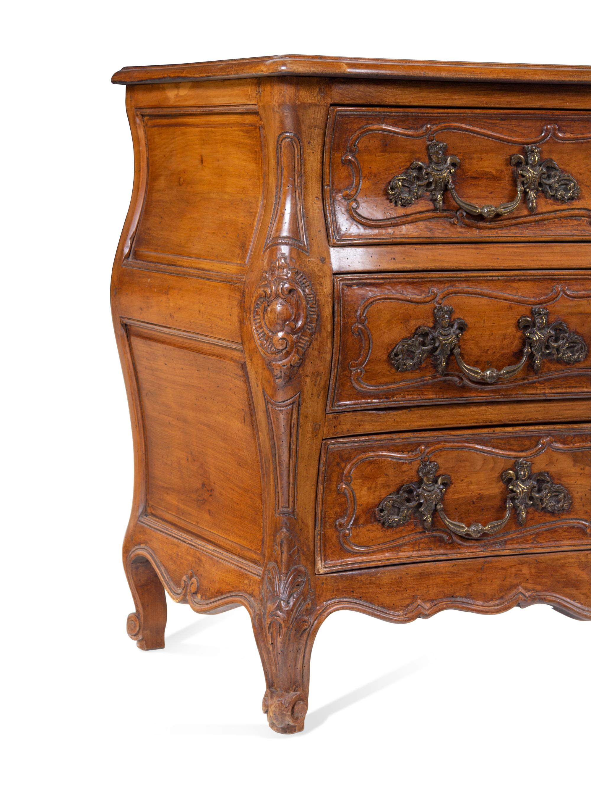 A Louis XV Provincial Style Walnut Commode