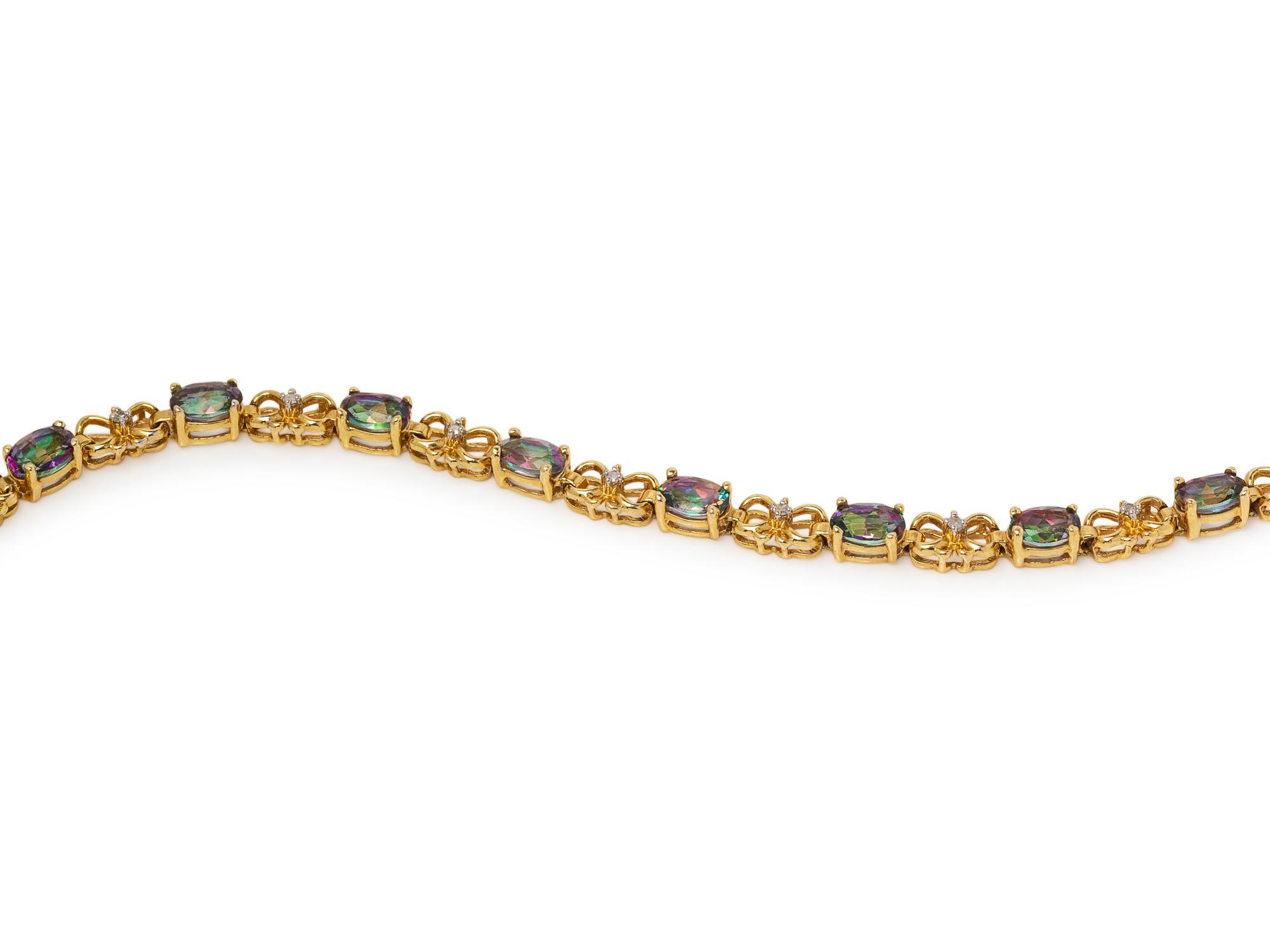 A Yellow Gold and Mystic Topaz Demi-Parure,