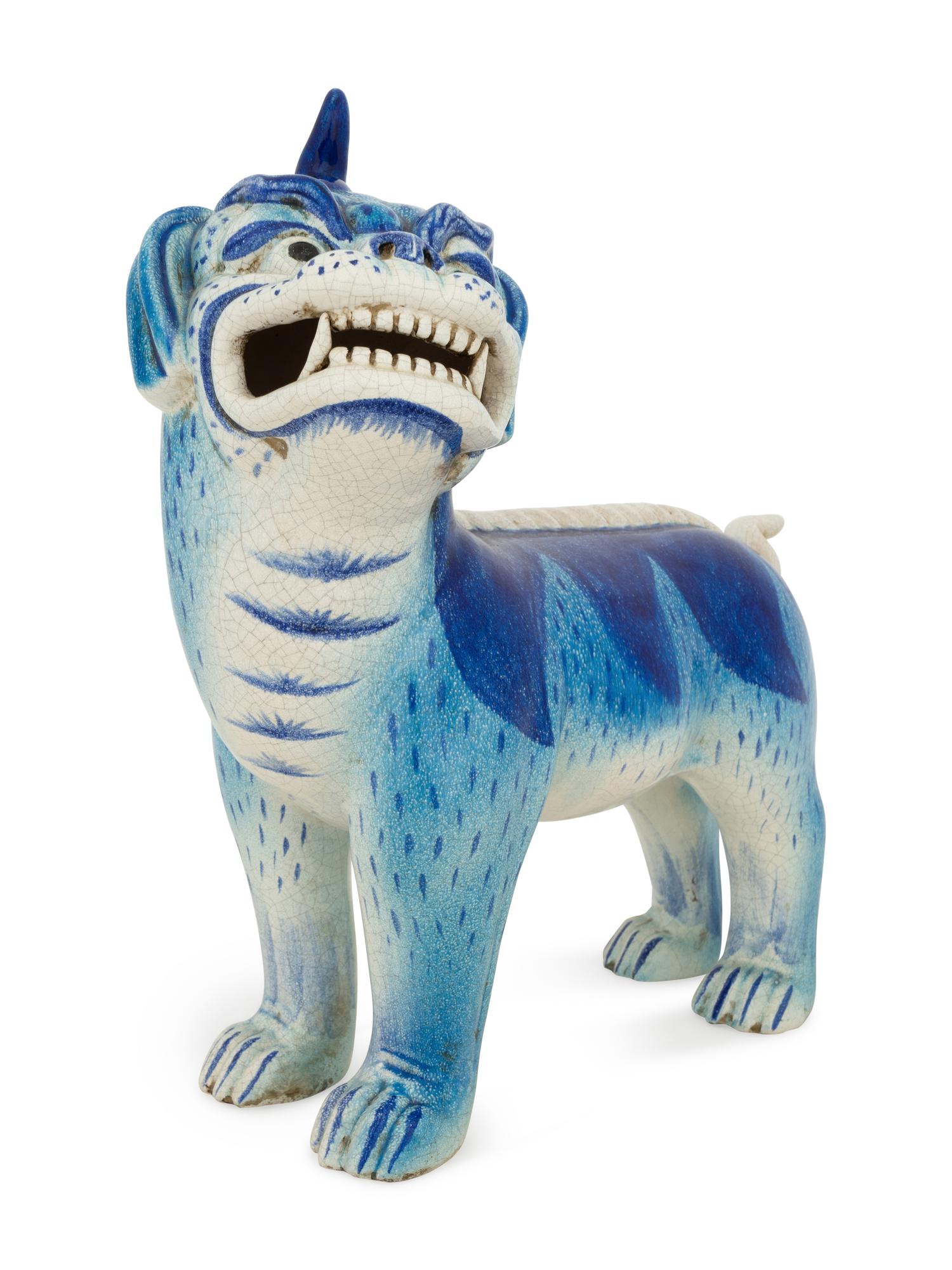 A Glazed Earthenware Guardian Lion