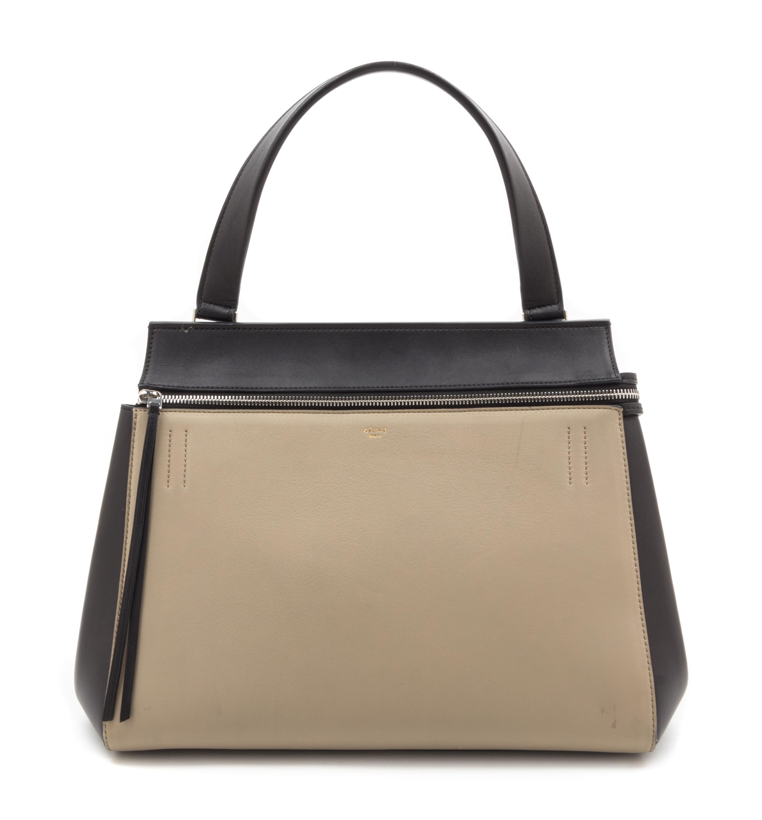A Celine Taupe and Black Leather Edge Handbag, 14" x 11" x 7".