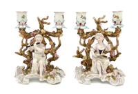 A Pair of Sitzendorf Porcelain Two-Light Figural Candelabra, Height 8 inches.