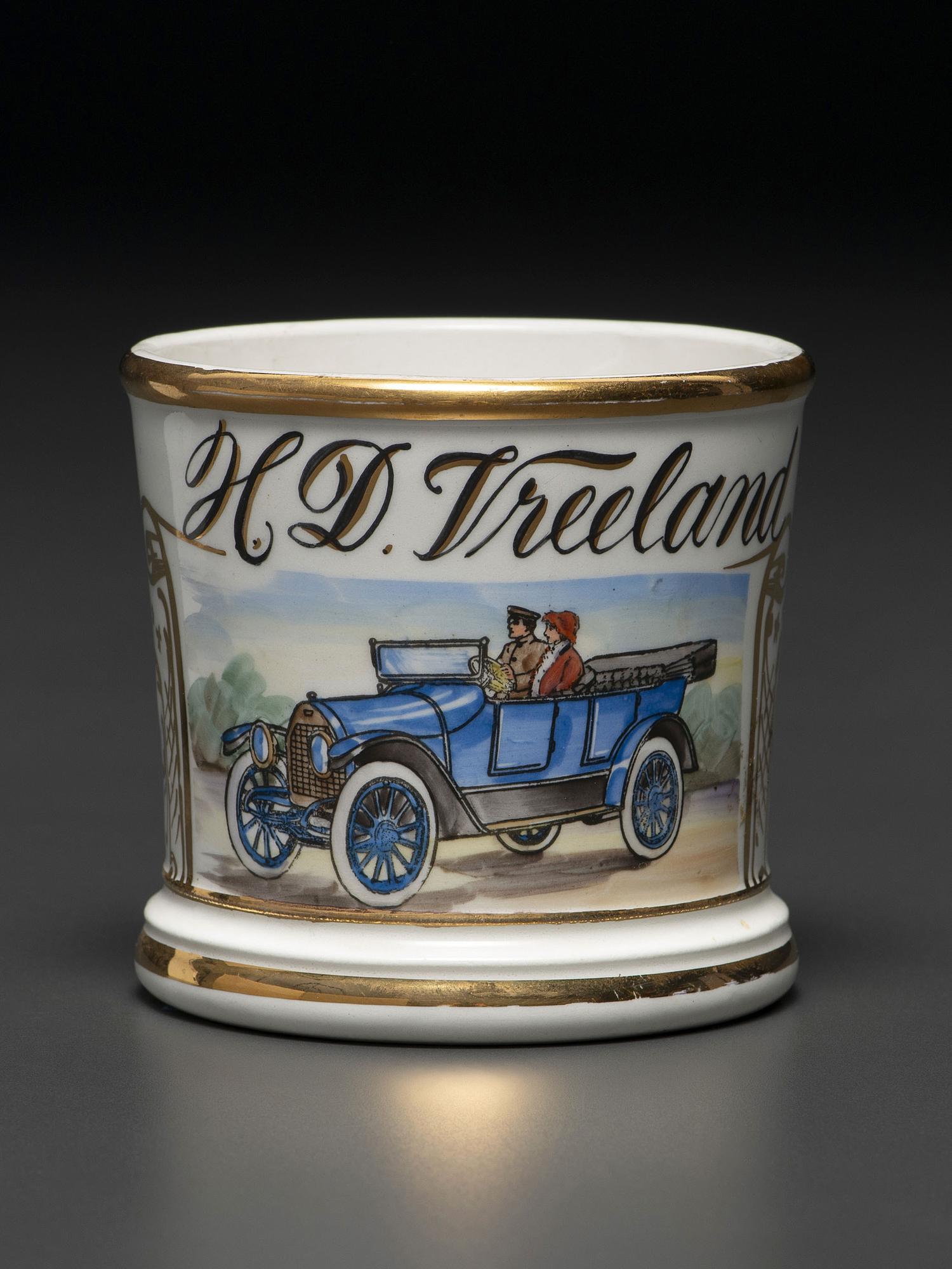 A Porcelain Shaving Mug Depicting an Open Touring Car