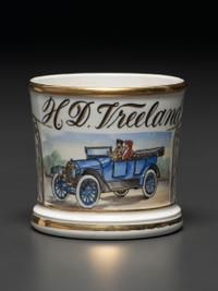 A Porcelain Shaving Mug Depicting an Open Touring Car