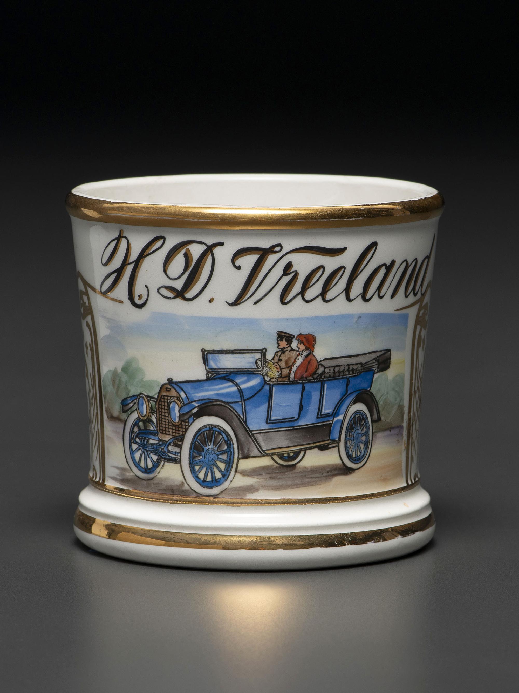 A Porcelain Shaving Mug Depicting an Open Touring Car