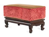 An Indian Carved Hardwood Low Stand Converted to an Upholstered Bench