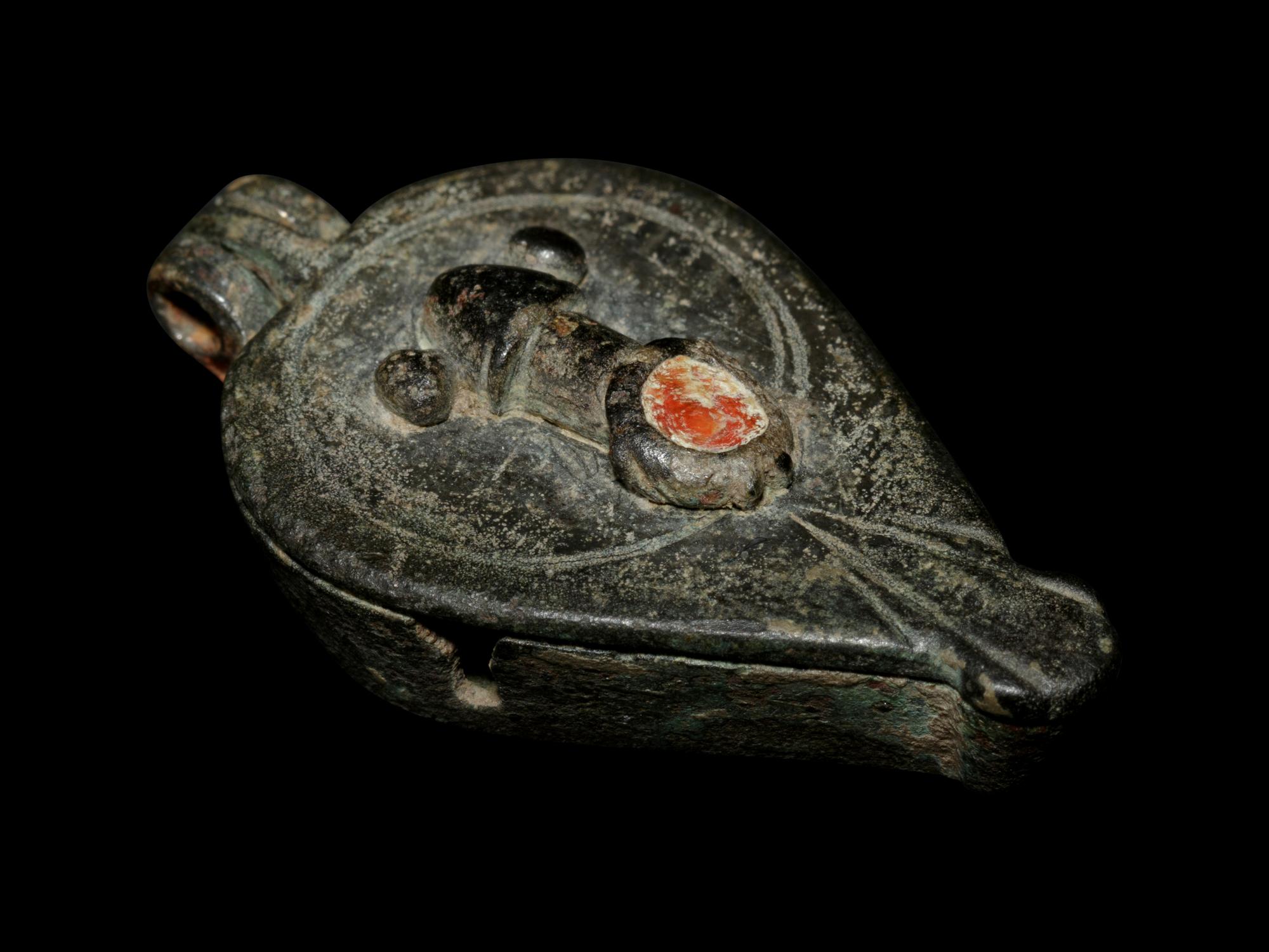 A Late Roman Bronze and Enamel Pendant with Phallic Symbols