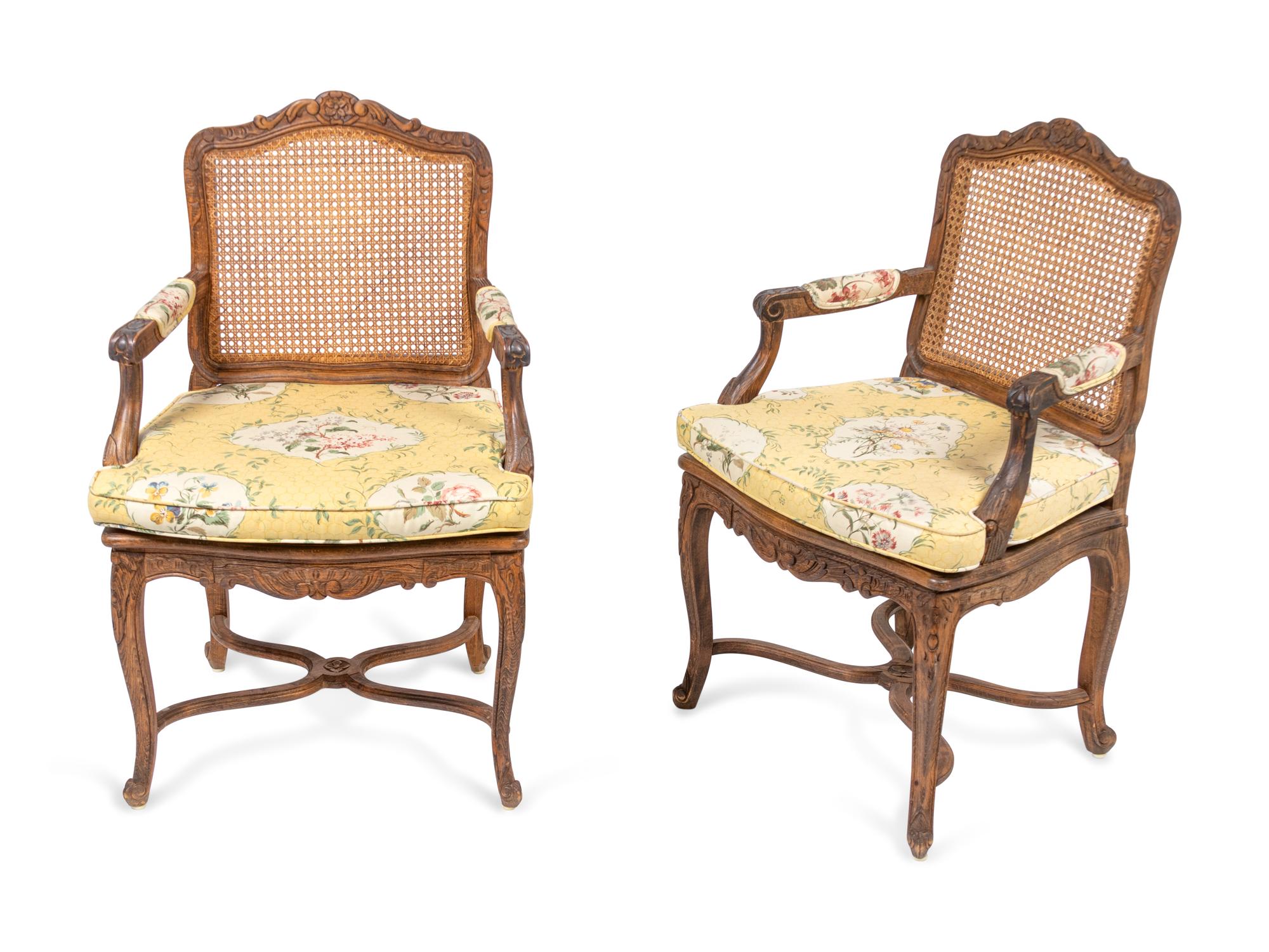 A Set of Four Louis XV Style Caned Oak Fauteuils