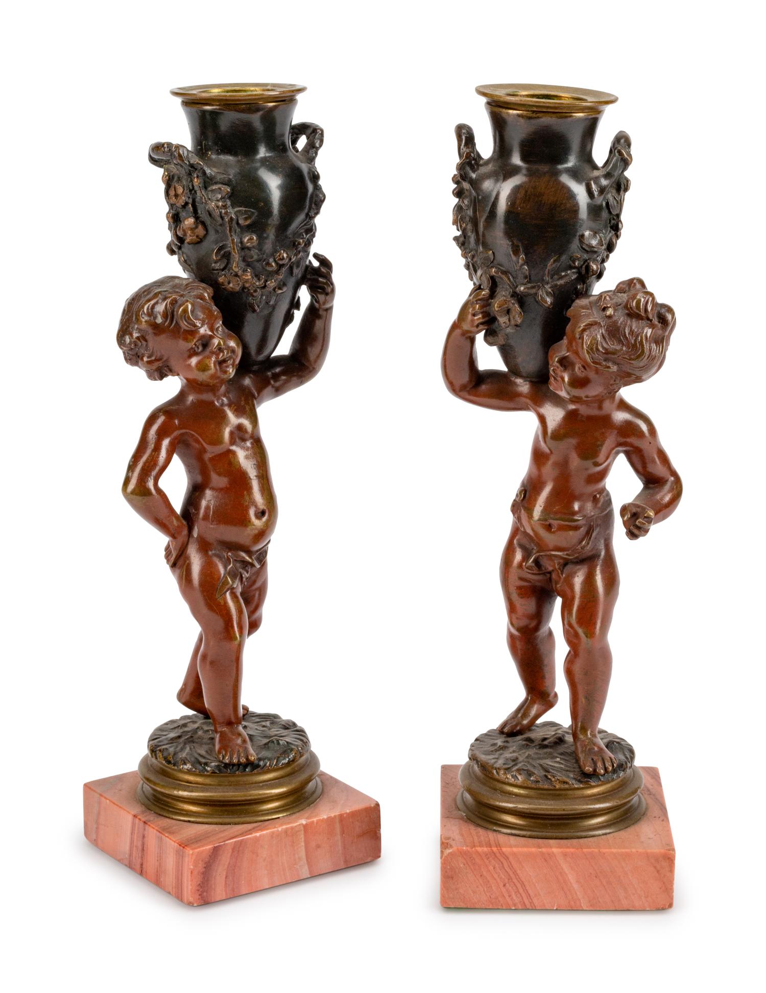 A Pair of French Patinated Bronze Figures of Infant Water Carriers — CIRCA 1900