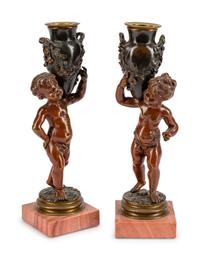 A Pair of French Patinated Bronze Figures of Infant Water Carriers — CIRCA 1900