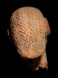 A Hellenistic Terracotta Head of a Grotesque