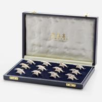 Garrard & Co. Ltd. (English, active 1722-Present) Set of Twelve Sterling Silver Dolphin-Form Place Card Holders, UK, 1995