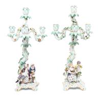 A Pair of Meissen Porcelain Four-Light Figural Candelabra, Height 17 inches.