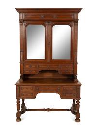 An English Carved Oak Bureau Cabinet
