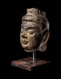 A Chinese Carved Stone Head of Buddha