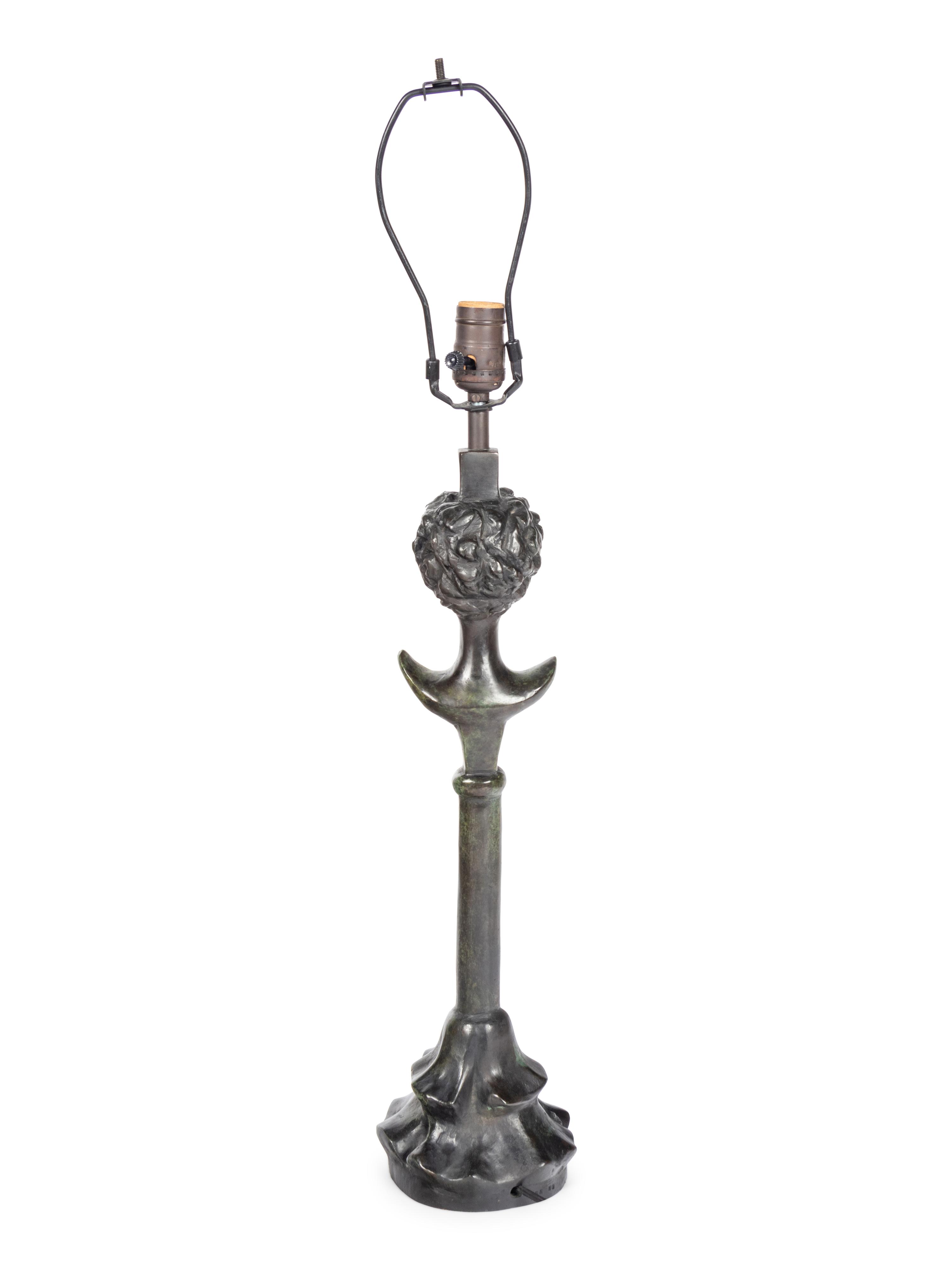 A Bronze Figural Lamp in the Style of Giacometti